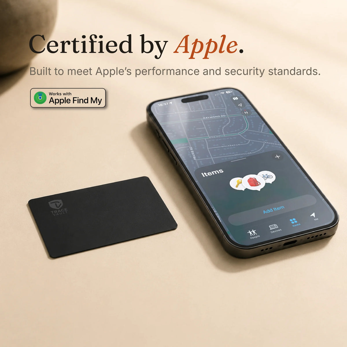 Trace Vault tracking card beside a smartphone on a beige surface, highlighting Apple certification and security standards for reliable item tracking.