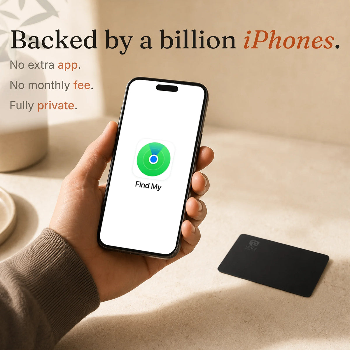 Hand holding a smartphone with Apple Find My open beside a Trace Vault tracking card, showing compatibility with the Find My network.
